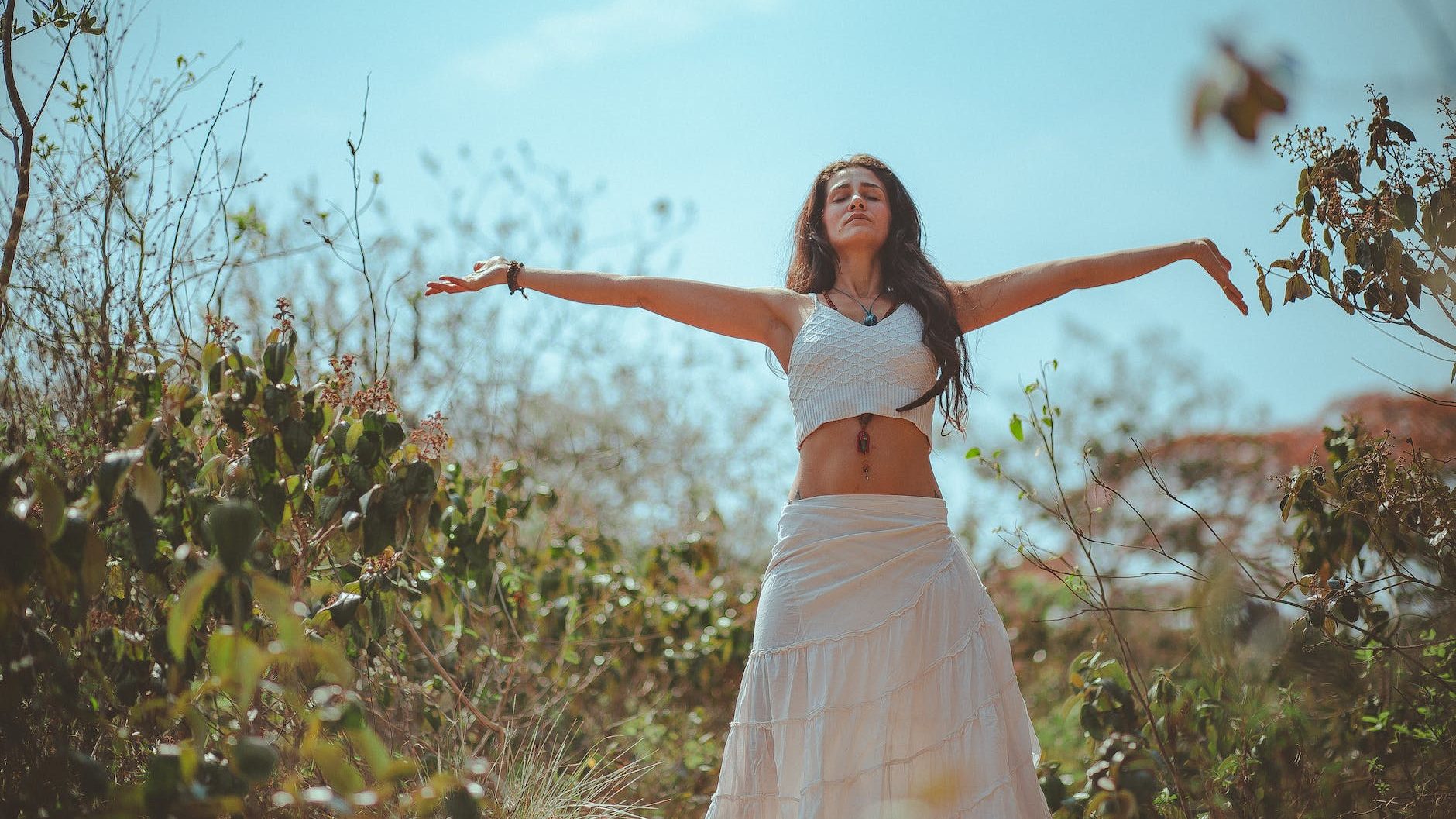 woman spreading both her arms